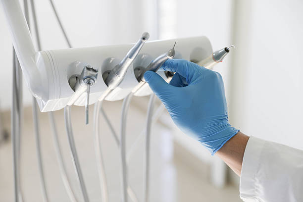 Professional Tooth Extraction technician working in Troy, IL